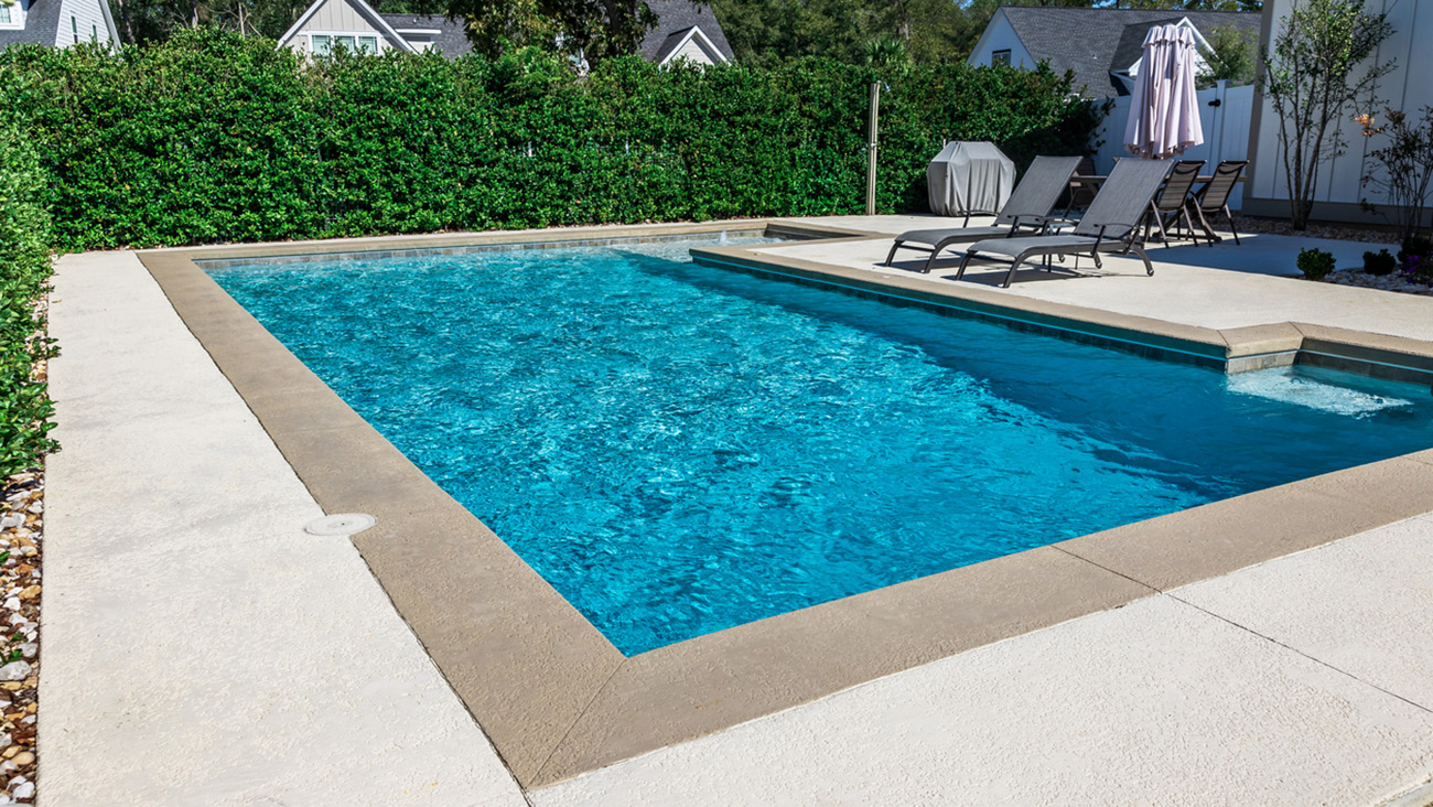 Custom limestone pool coping and spa surround — Tulip Precast